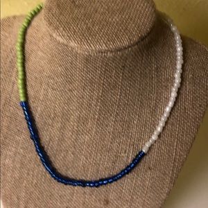 We love the earth necklace